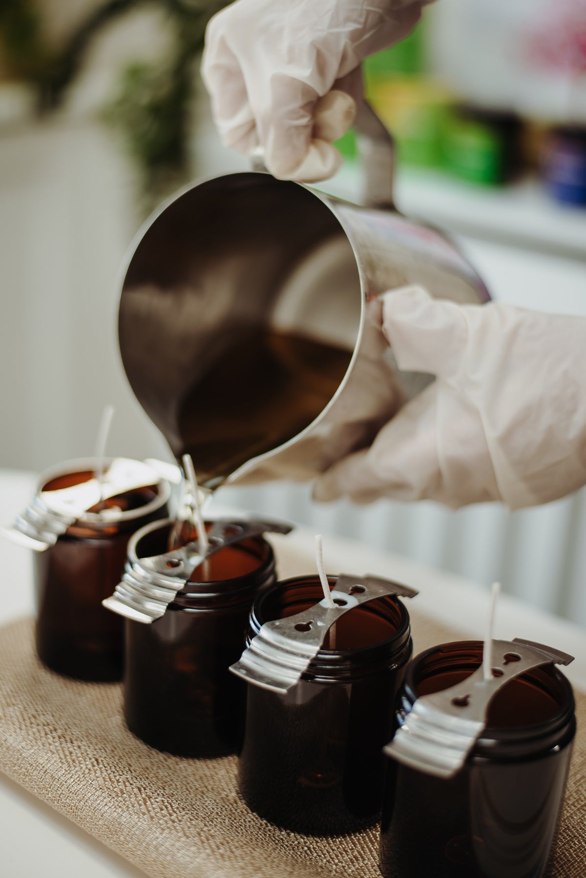 Process of pouring the natural ingredients into Wizard & Grace's essential oil candles