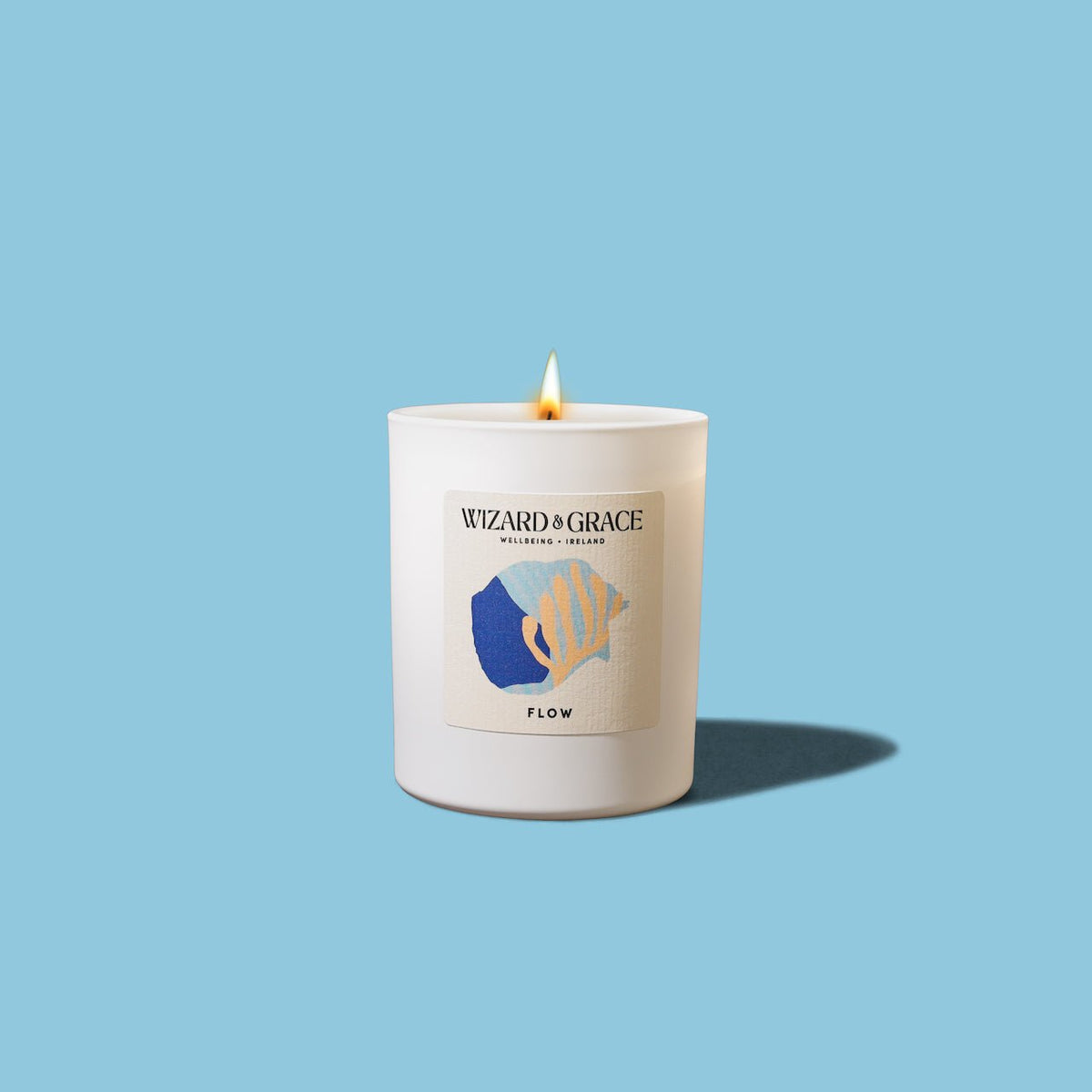 Flow Essential Oil Candle by Wizard &amp; Grace, featuring a blend of Peppermint, Eucalyptus, and May Chang essential oils.