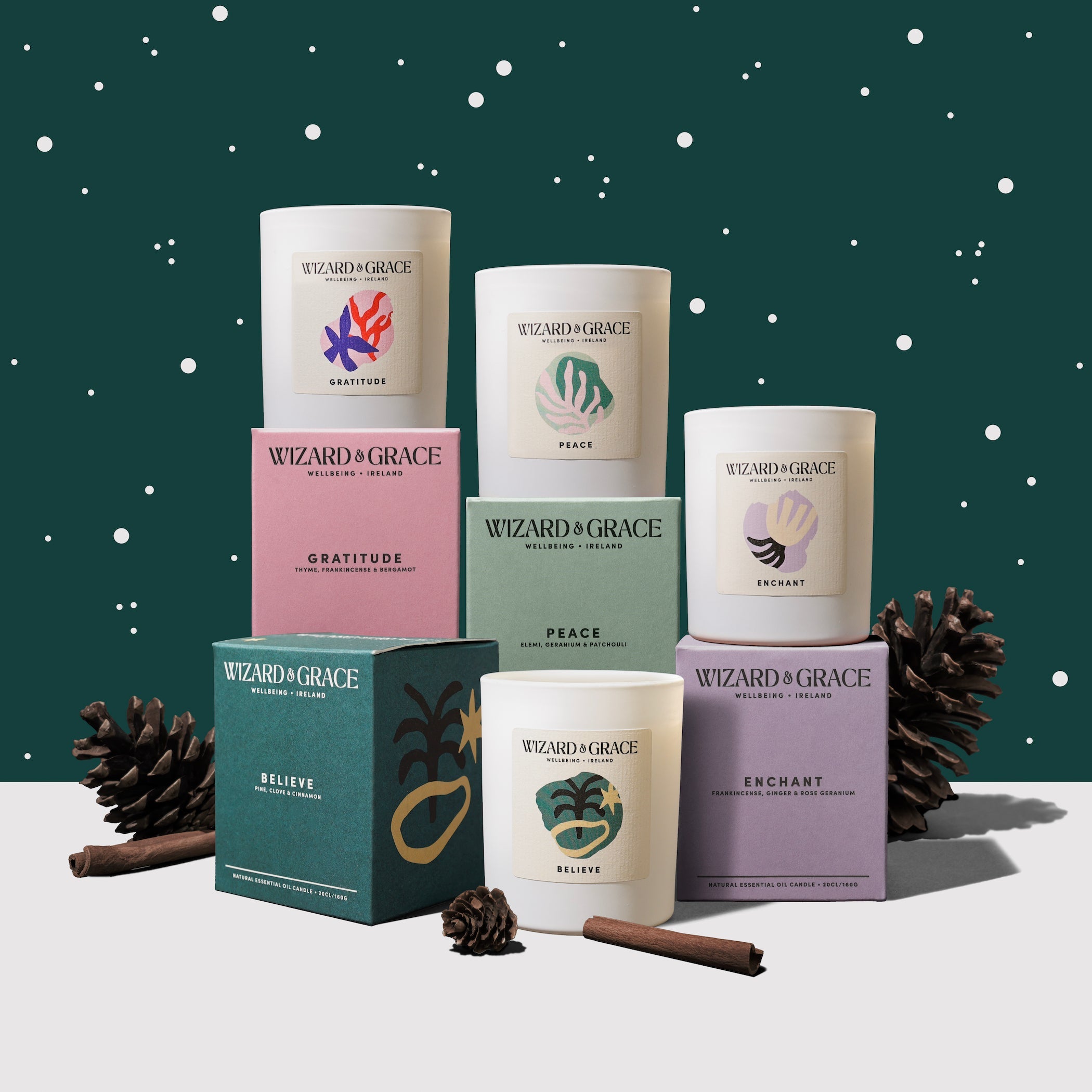 The Nollaig Set - 4 essential oil candles by Wizard & Grace, a luxury Christmas gift set promoting wellbeing and holiday relaxation.